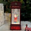 Waterlight Carols | Santa In a Telephone Booth